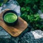 photo of matcha drink on a wooden tray