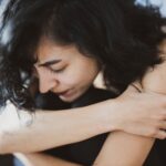 woman wearing black camisole