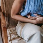 woman suffering from a stomach pain