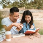 a couple reading book together